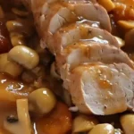 Lombinho de porco com molho de cogumelo e cerveja