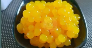 Esferas de Iogurte com Calda de Manga e Caviar de Hortelã